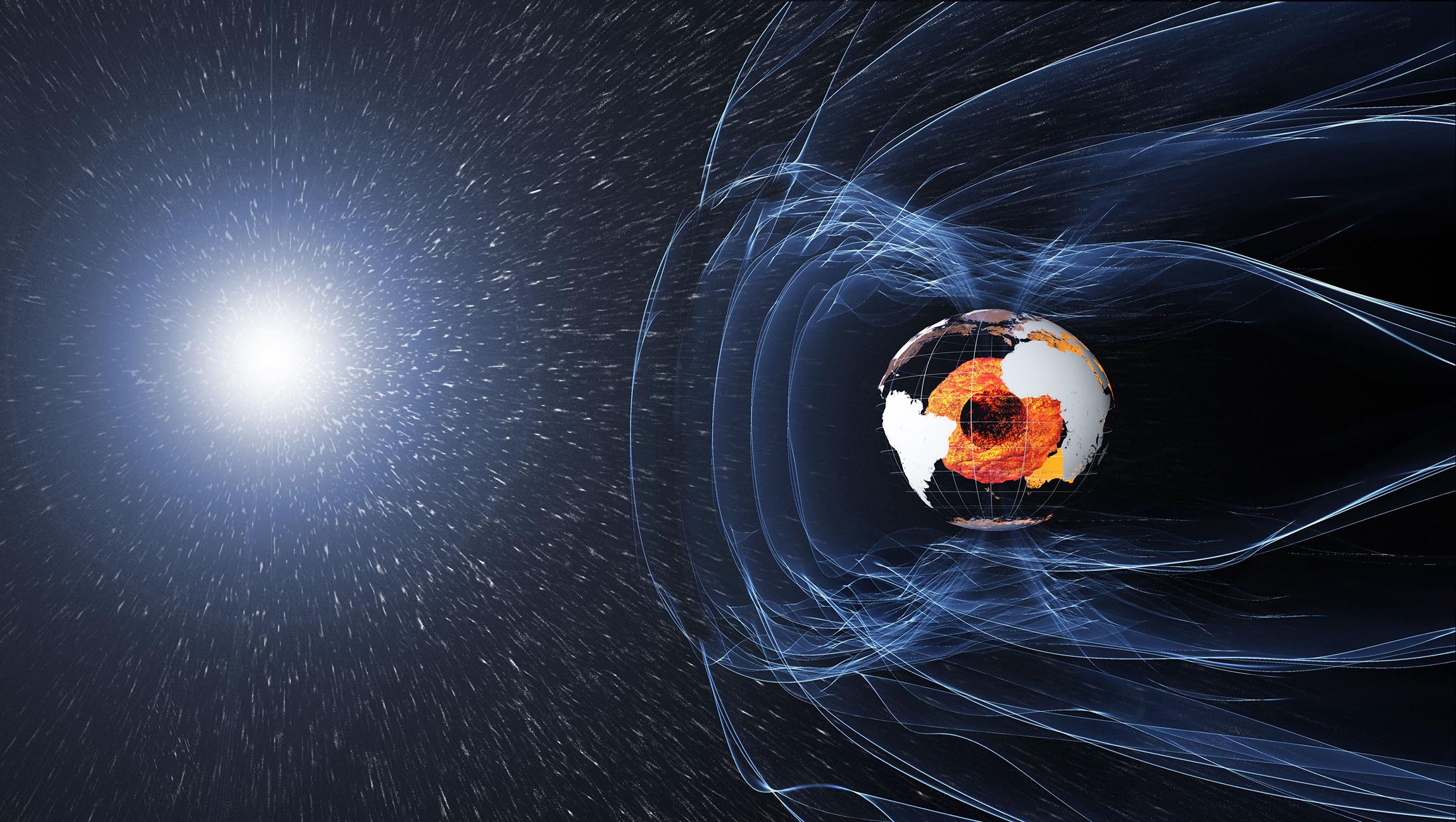 Ilustración del campo magnético generado desde el núcleo de la Tierra y la manera en la que deflecta las partículas provenientes del Sol.